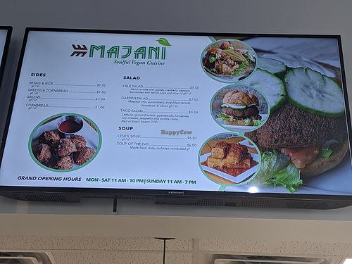 Menu board at Majani #2 in Chicago