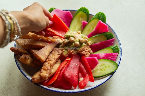 Garden Pita Platter - 
chilled tomato tofu spread, garlic chile herb relish, crispy pita, cucumber, red pepper radish at Centraal Grand Café and Tappery in Milwaukee
