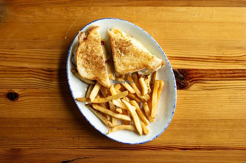 Cheese melt - fontina cheese blend, sourdough, served with friets or spicy garlic kettle chips at Centraal Grand Café and Tappery in Milwaukee
