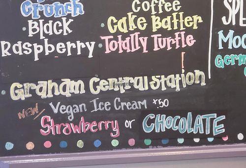 "New vegan ice cream" displayed on the flavors board. They had strawberry and chocolate on the day I visited. at Izzy's Frozen Yogurt & Ice Cream in Portsmouth