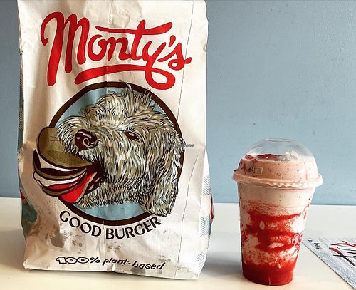 Bag of burgers and strawberry shake   at Monty's Good Burger - Echo Park in Los Angeles