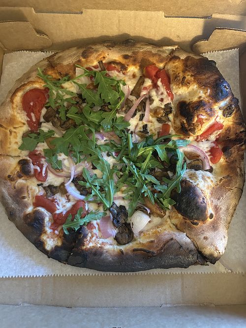 Farmer’s Market pizza with vegan cheese   at Cosa Pizza - Food Truck in Chincoteague