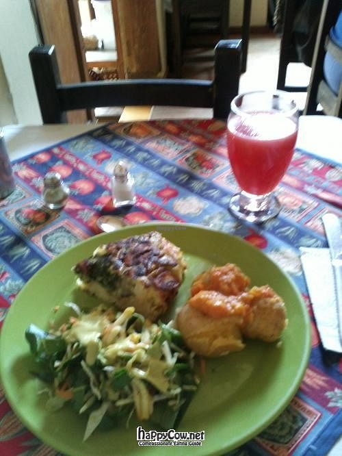 Vegetables omelette, potatoes with peanut sauce, salad, and watermelon juice. at Quinua y Amaranto in Bogota