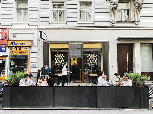 The outside seating on Taborstr at Figar Bao Bun in Vienna