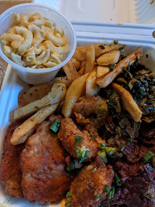 Mob plate, spicy chickn, shrimp, barbq brisket with collards, fries & smackaroni at Vegan Mob in Oakland