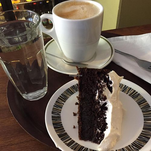 Chocolate and Stout cake and oat milk latte  at Fortify Cafe in Maidstone