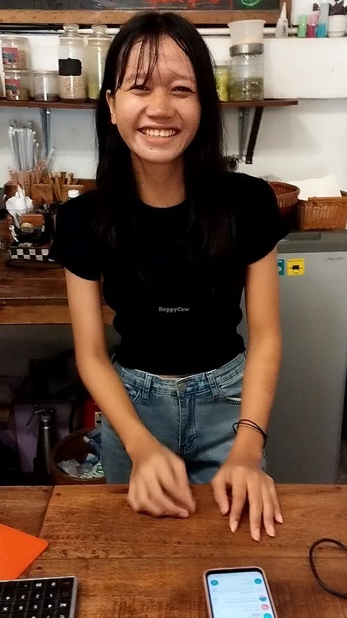 Nita at the counter at Sacred Lotus Cafe in Phnom Penh