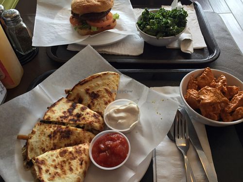 quesadillas with curry tofu and vegan cheeseburger with kale salad at NuVegan in Washington