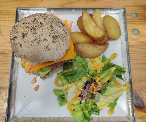 Faux egg, cheese, beyond burger at Veganitessen in Sevilla