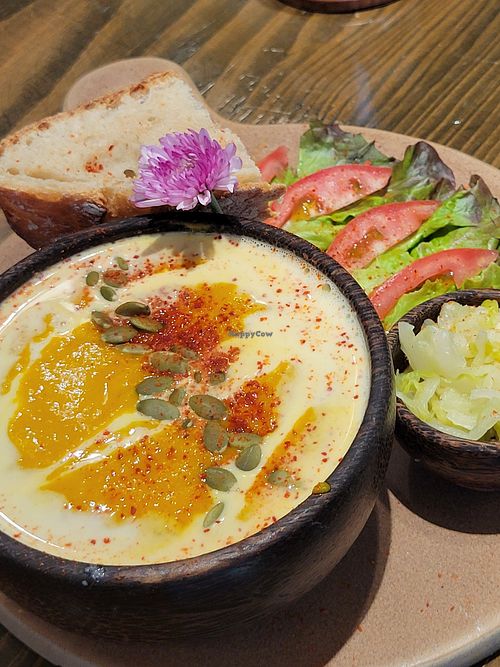 Pumpkin soup with side of sauerkraut at The Banana Warrior - Emquartier in Bangkok
