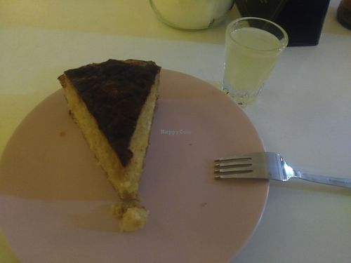 Vegan cake and homemade shot. at Yellow Bistro in Lodz
