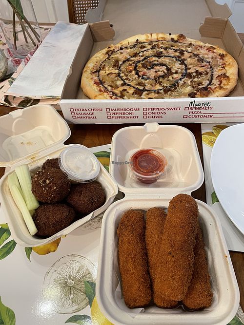 Uncle Buck pizza, jackfruit wings, and mozzarella sticks.  at New Ethic in Rochester