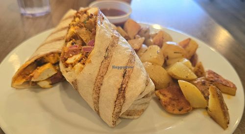 Vegan Breakfast Burrito with potatoes and Sriracha sauce at Groundswell in Cedar Rapids