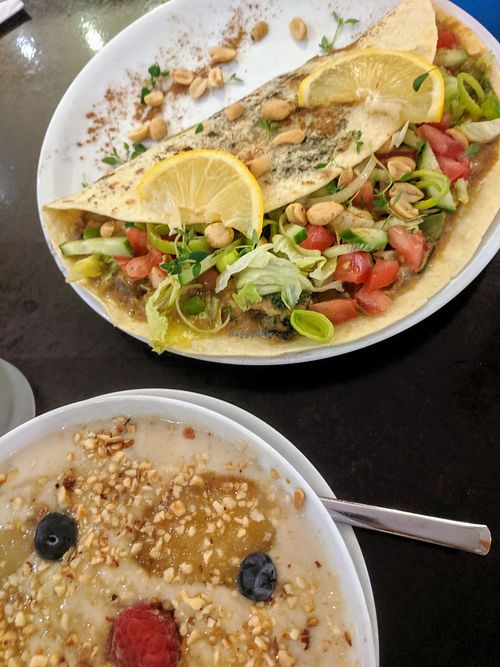 Asian burrito and the porridge :) at Cafe M in Coburg