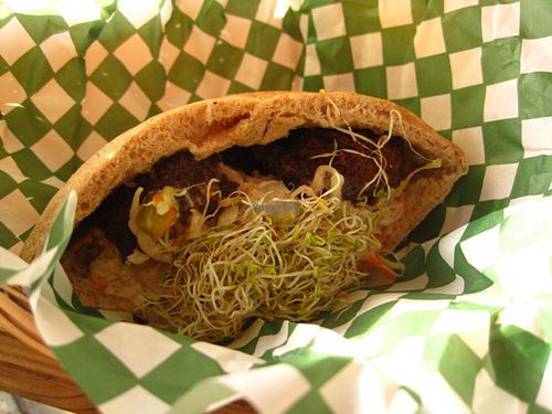 This is the traditional falafel sandwich (I only took half a pita) which made La Panthère Verte so famous. at Panthere Verte - Mile End in Montreal