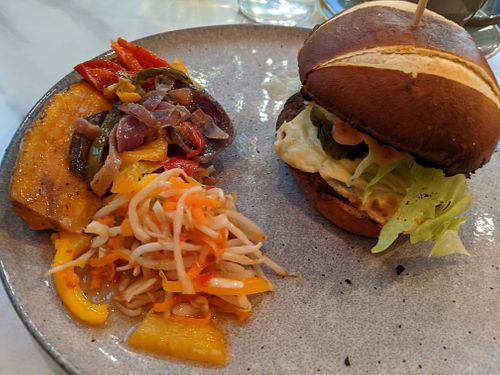 Cheeseburger with added side salad at Vertigo - Jack Rosenthal in Manchester