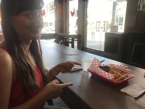 About to dive into a spicy vegan chx sammich ! at 24 Hot Chicken & Waffle Bar in Studio City