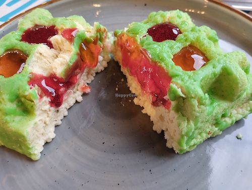 Pistachio cake with rice puffs, peach and raspberry jam at Garun in Yerevan