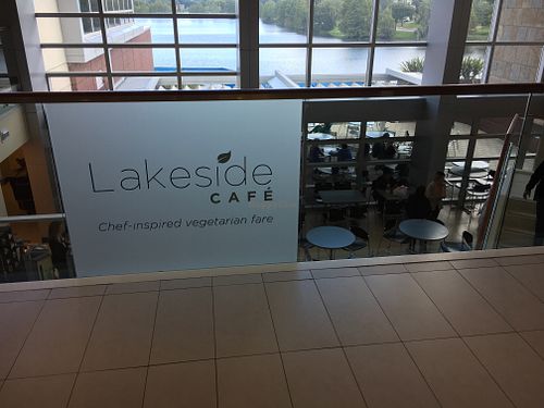 Lakeside Cafe Sign on railing  at Lakeside Cafe in Orlando