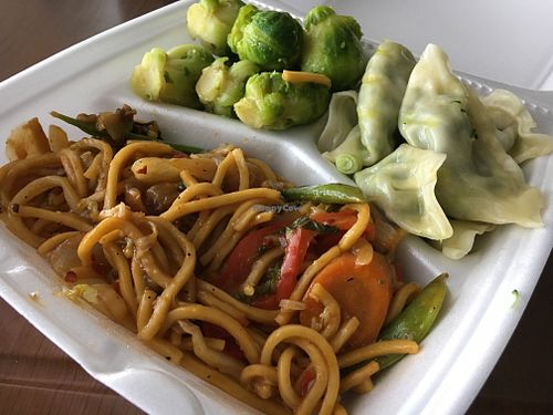 Stir fry peanut noodles with Brussels and steamed dumplings   at Lakeside Cafe in Orlando