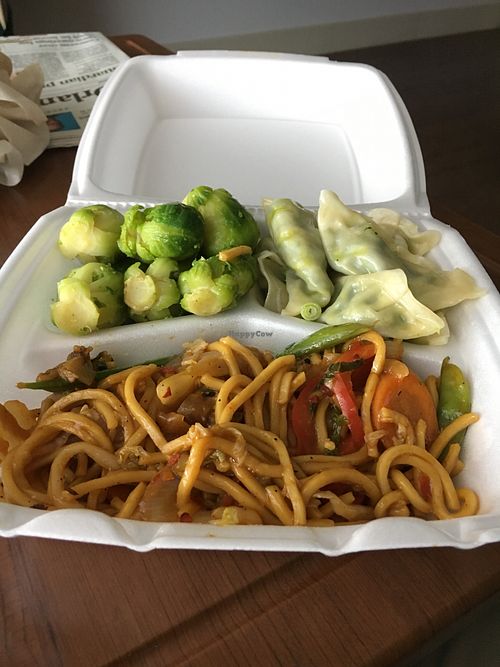 Stir fry peanut noodles with Brussels and steamed dumplings.  at Lakeside Cafe in Orlando