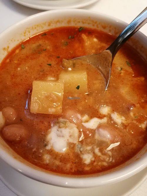 Beans, carrots, turnip, celery, onion, potato, soy yogurt at Napfényes Restaurant & Confectionery in Budapest