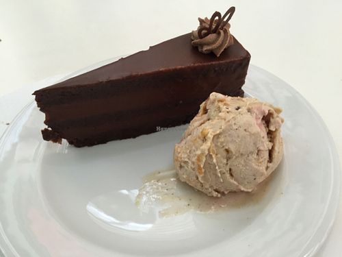 Chocolate cake with caramel ice cream at Napfényes Restaurant & Confectionery in Budapest