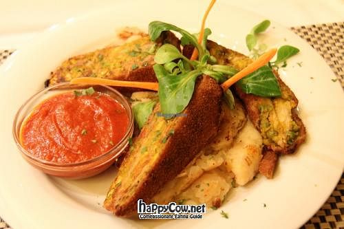 Fried Pancakes Filled with Vegetable Cream served with Mashed Potatoes and Onions at Napfényes Restaurant & Confectionery in Budapest