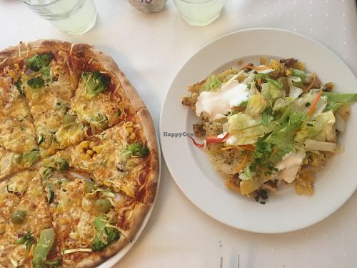 Pizza and layered potatoes  at Napfényes Restaurant & Confectionery in Budapest