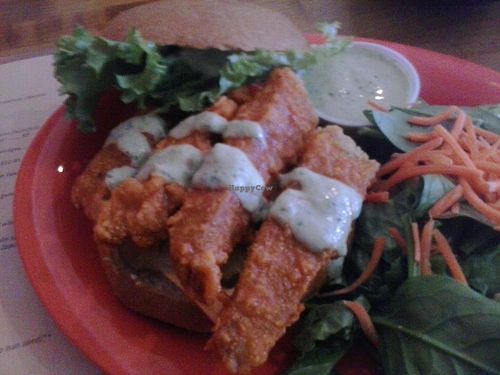 Buffalo Wings Sandwich.  

Sooo freakin' good!  !^_^!

Not on the main menu, but it seems to be a special not too infrequently.   at Souley Vegan in Oakland