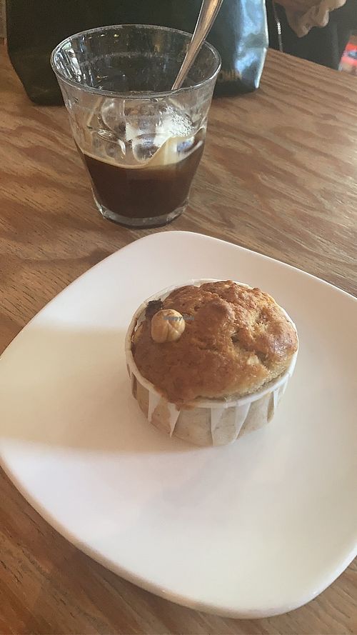 iced americano and vegan banana bread muffin   at Tribeka in Graz