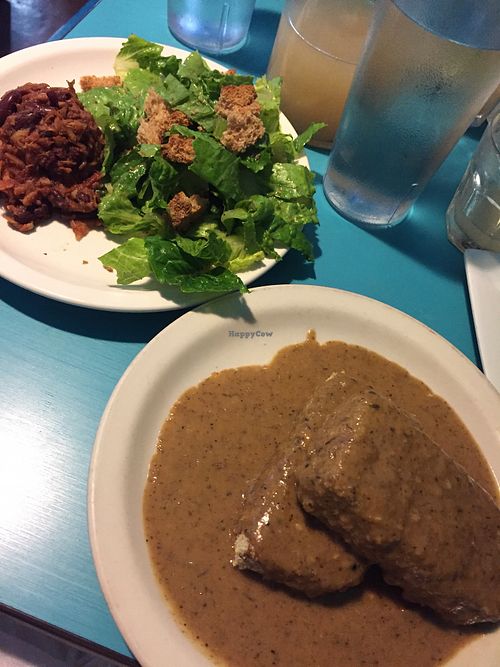 Southern fried seitan with gravy, Caesar salad, and bbq jackfruit at Counter Culture in Austin