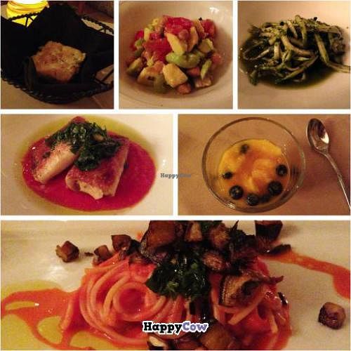 5 course - all vegan & organic dinner. Raw zucchini pasta, chickpea avocado salad, rosemary bread with olive oil, baked mezze with chickpea puree and a tomato sauce, pasta with roasted eggplant and a carrot tomato sauce, mango puree with blueberries. at Escopazzo in Miami Beach