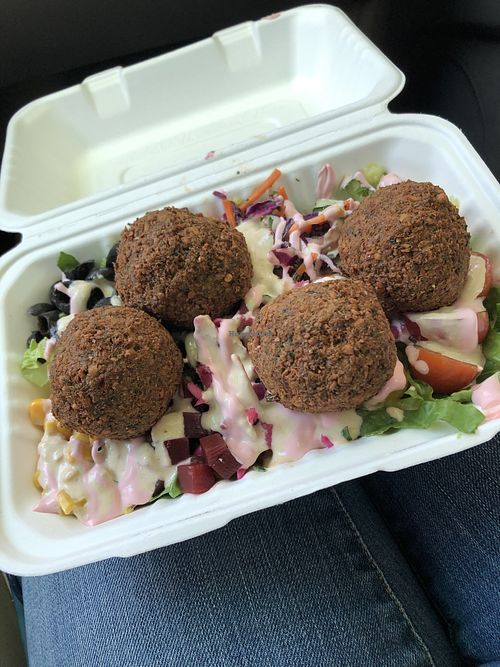Vegan Falafel Bowl to go with pink tahini sauce  at Bo's Falafel Bar in Bend