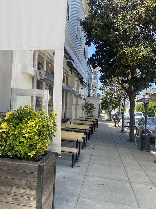 Plenty of Outdoor Seating on Side of Building  at Wildseed in San Francisco