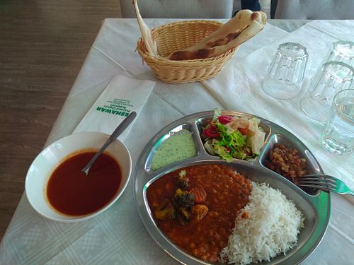 Tomato soup, naan, dal masala, sabzi mix with rice, salad, spicy pickles and mint sauce at Peshawar in Espoo