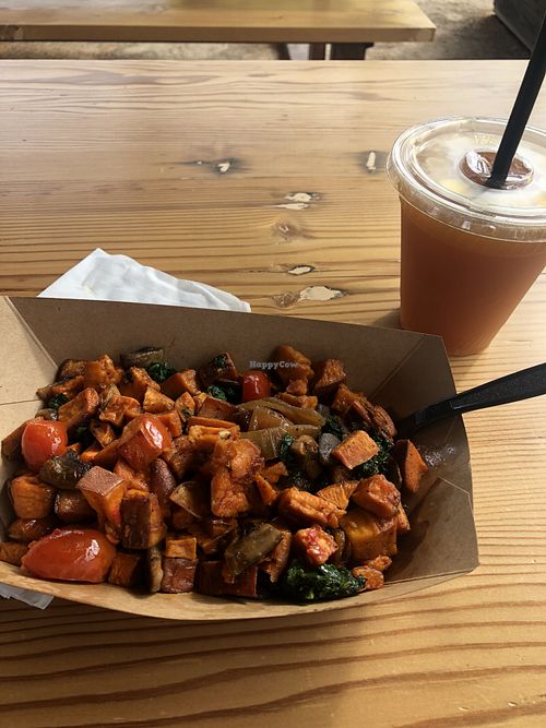 Spicy Vegan Hash from Nest with fresh apple juice.  at SteelCraft in Garden Grove