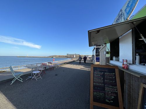 Roots - tables by the sea  at Roots in Aberdeen