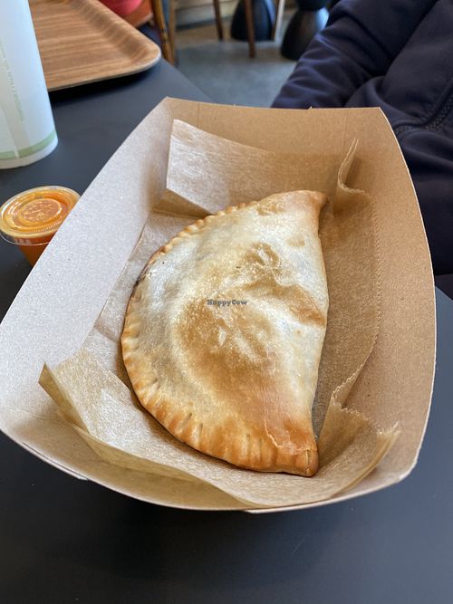 Portobello mushroom empanada with awesome sauce!! at Que Gusto in Tulsa