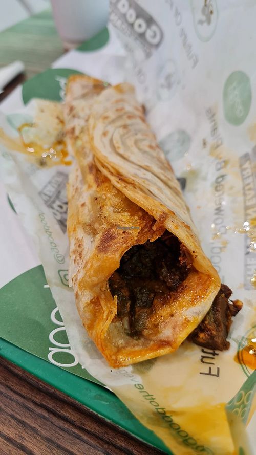 Chettinad Sukka Roll w/green chutney. Good but super oily at GoodDO - Bandra West in Mumbai