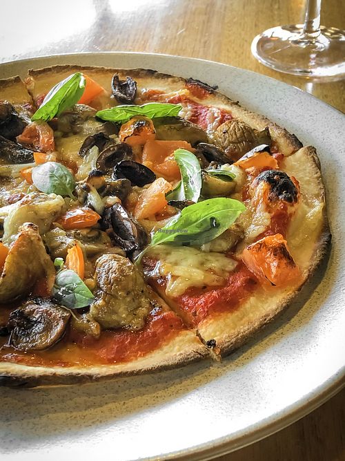 Charlie the Vegan pizza with cheese added at Balthazar in Adelaide