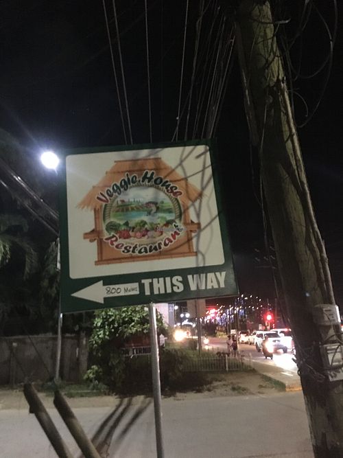 sign at the street at Veggie House in Puerto Princesa