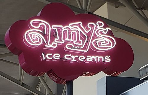 Sign gate 21 at AUS - Amy's Ice Cream in Austin