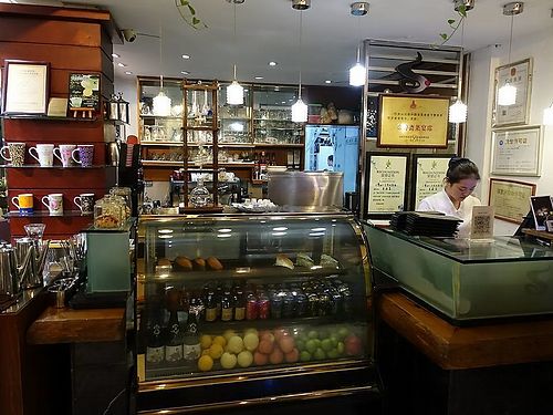 payment counter with selection of fruits and drinks at Samadhi Art & Cafe in Xiamen