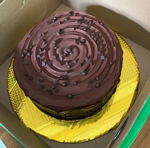 Great moist cake with tasty frosting and a nice firm chocolate shell at Yvitta in Merida