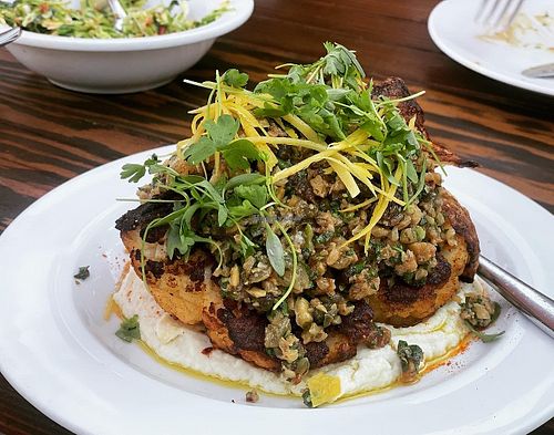 griddl’d cauliflower, cauliflower “tahini,” walnut raisin caper relish.  at Hippo in Los Angeles