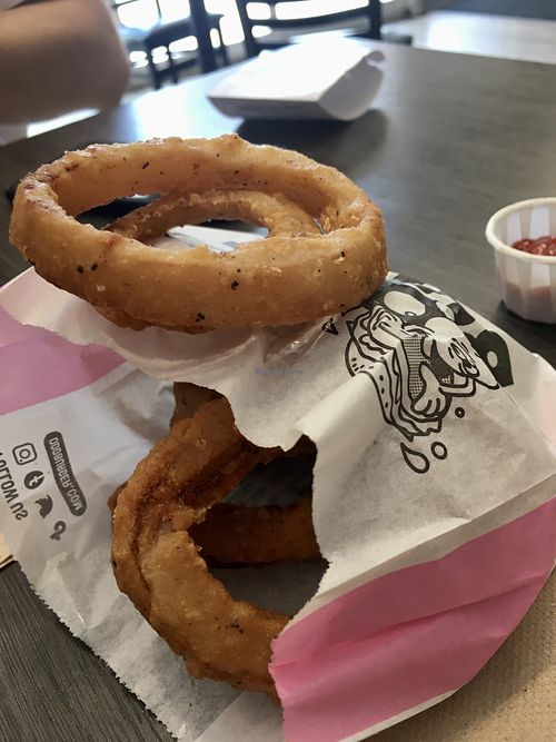 Tempura battered onion rings  at Odd Burger in Toronto
