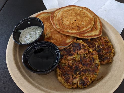 Light fluffy cinnamon wheat hotcakes, with maple syrup. Jackfruit crab cakes with housemade tartar sauce. at SO Veganly in Spring