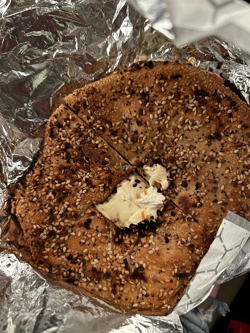 Flagel with vegan veggie cream cheese  at Seaford Bagels in Seaford