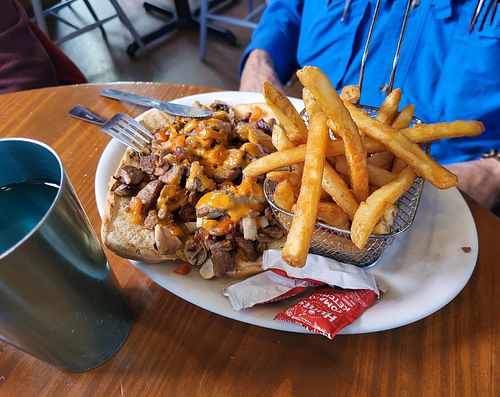 Sandwich and fries at Vegan Avenue in San Antonio